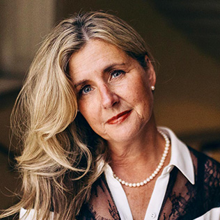 A woman with long blond hair.